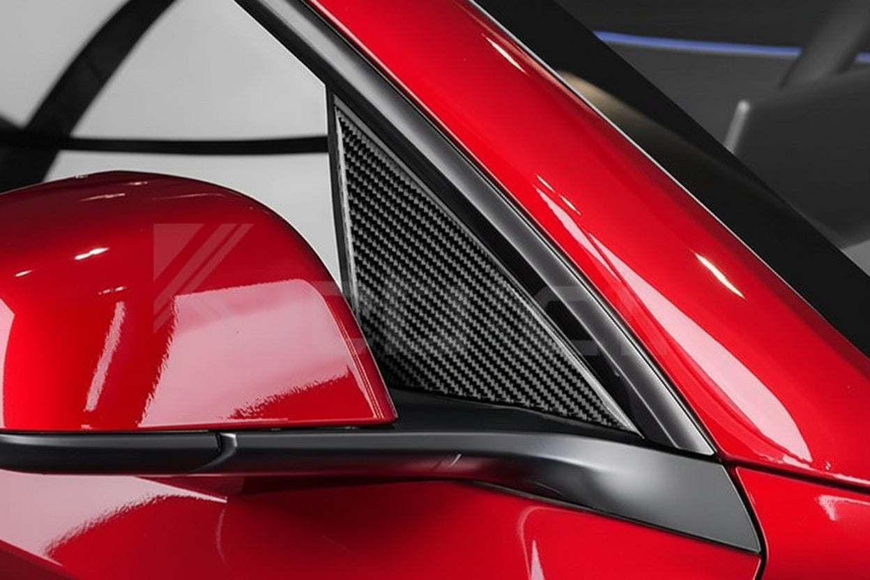 Close-up of a red car body panel with a black carbon-fiber textured side vent trim and glossy black window surround.