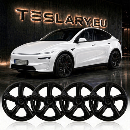 Four black multi-spoke alloy wheels displayed in the foreground, with a white Tesla Model Y in the background in front of a dark wall featuring the TESLARY.EU logo. tesla-model-y-juniper-19-durable-abs-full-wheel-cover-gloss-black-teslary-dublin-ireland-cork-nederlands-deutschland-espana-alicante-madrid-tesla-accessories-sh-8898662