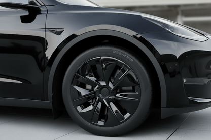 Close-up of a gray electric vehicle wheel with a black multi-spoke alloy rim and a black tire marked BISSOTTI 255/45 R17. TESLA_MODEL_Y_GLOSS_BLACK_19_WHEEL_COVERS_2022_2023_2024_2025_BUY_FROM_IRELAND_AND_EUROPES_TESLARY.EU